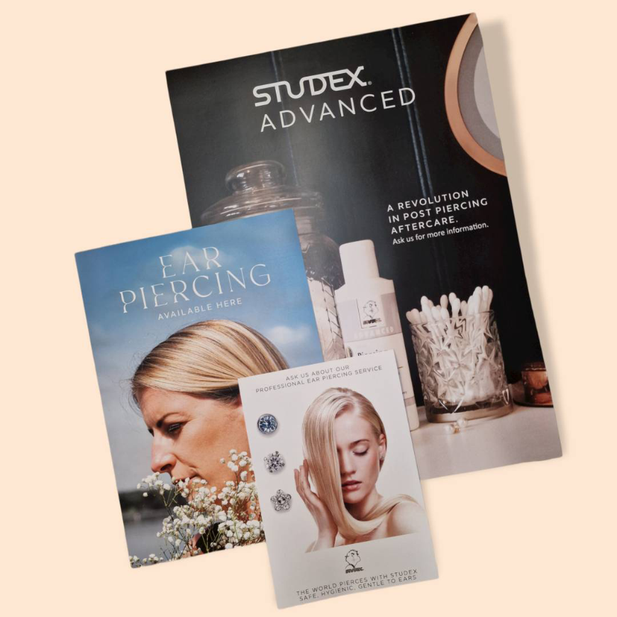 Branded posters and banners will draw customers to your stall or products